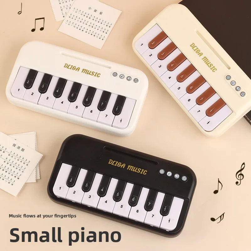 Three small electronic keyboards or pianos are displayed on a light background.