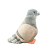 A soft gray plush toy of a pigeon with a pink foot.
