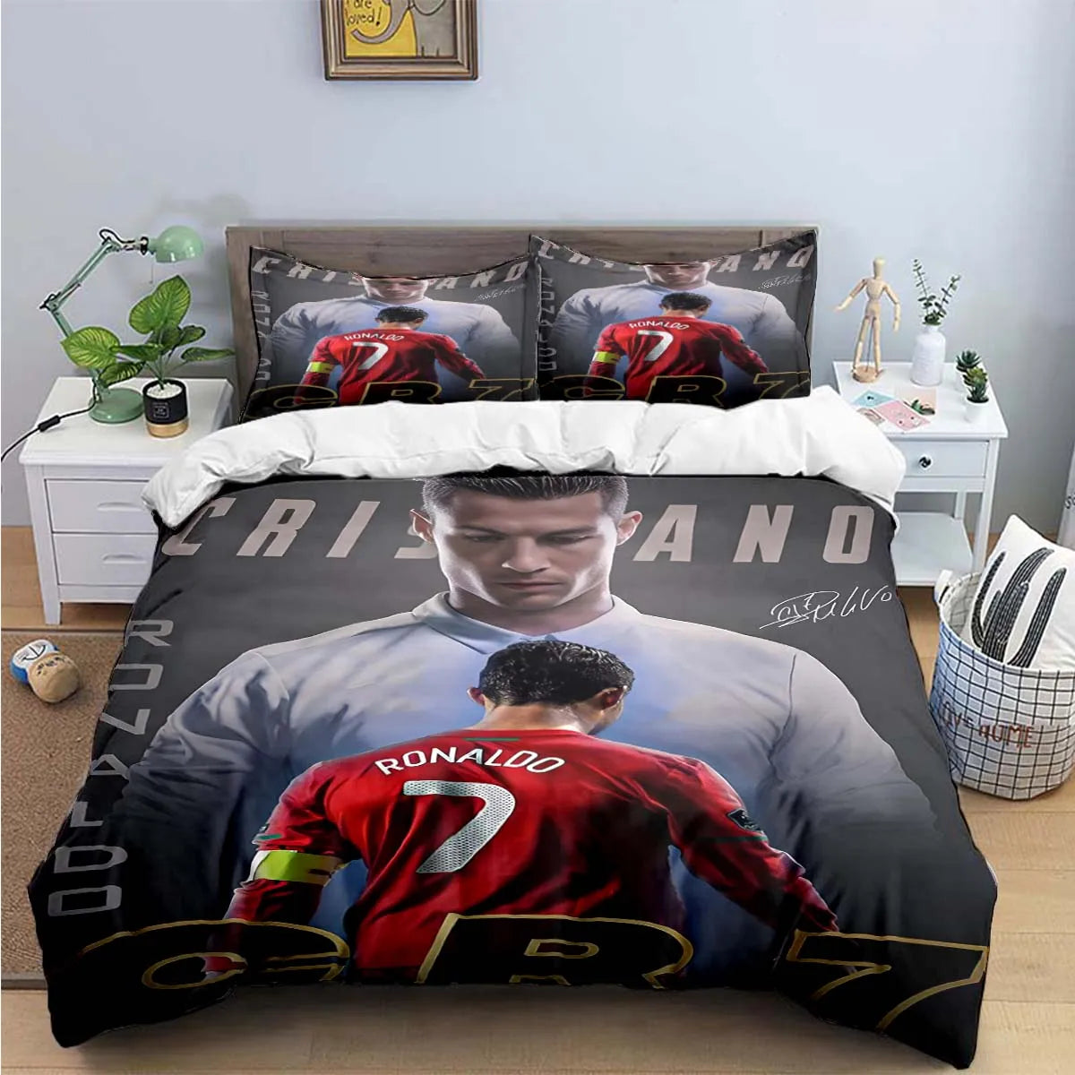 A large duvet cover featuring a graphic of Cristiano Ronaldo in a red jersey and a portrait of the player.