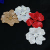A set of three crystal rhinestone flower sew-on patches in gold, white, and red.