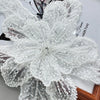 White floral lace applique patch covered in sequins used for sewing and DIY crafts