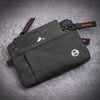 Black RFID-blocking travel wallet with a carabiner clip and a small white logo on the cover