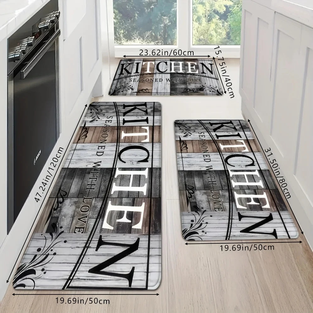A set of rectangular kitchen mats with wood grain patterns and non-slip backing displayed on a light wooden floor.