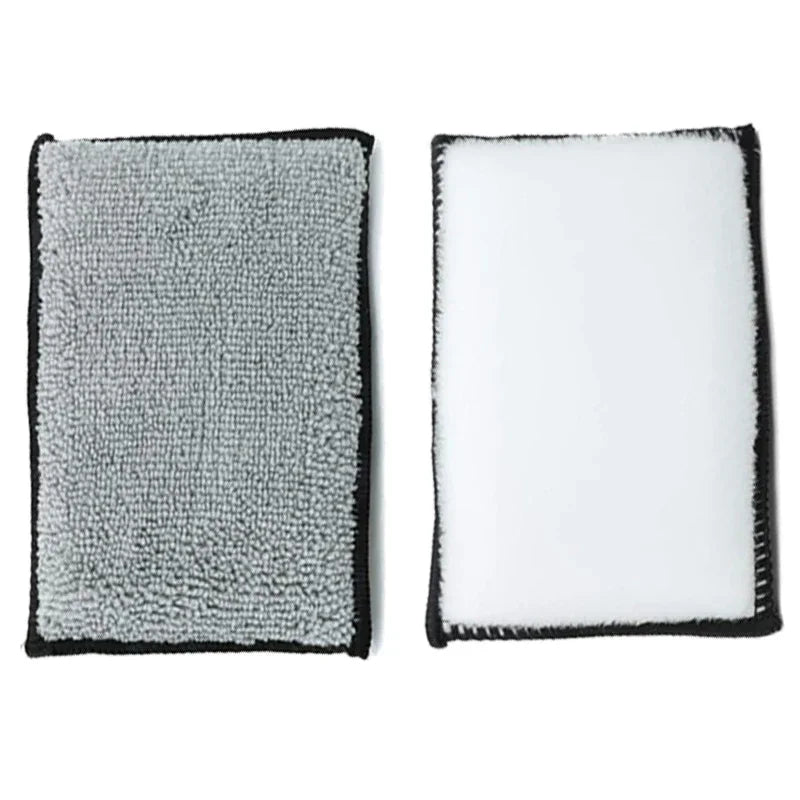 A pair of dual-sided microfiber scrub sponges for car detailing, one gray and one white.