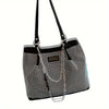 A black crystal-embellished chain shoulder bag with a textured pattern and gold hardware.