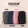 A set of four RFID-blocking passport holders in gray, dark blue, pink, and black are displayed on a light background.