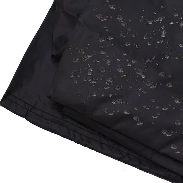 Black heavy-duty waterproof BBQ grill cover with small perforations