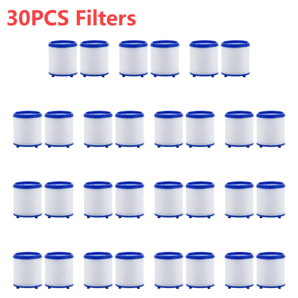 A collection of thirty filters for a faucet water filter purifier, shown in various white and blue colors.