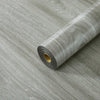 Roll of self-adhesive wood grain floor stickers in gray for peel-and-stick wallpaper
