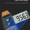 A close-up of a digital tachometer measuring 9563 RPM, showing a large screen display.