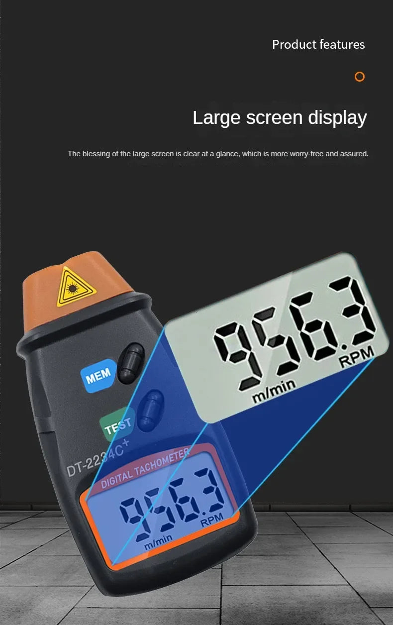 A close-up of a digital tachometer measuring 9563 RPM, showing a large screen display.