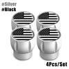 Set of four silver and black American flag tire valve caps