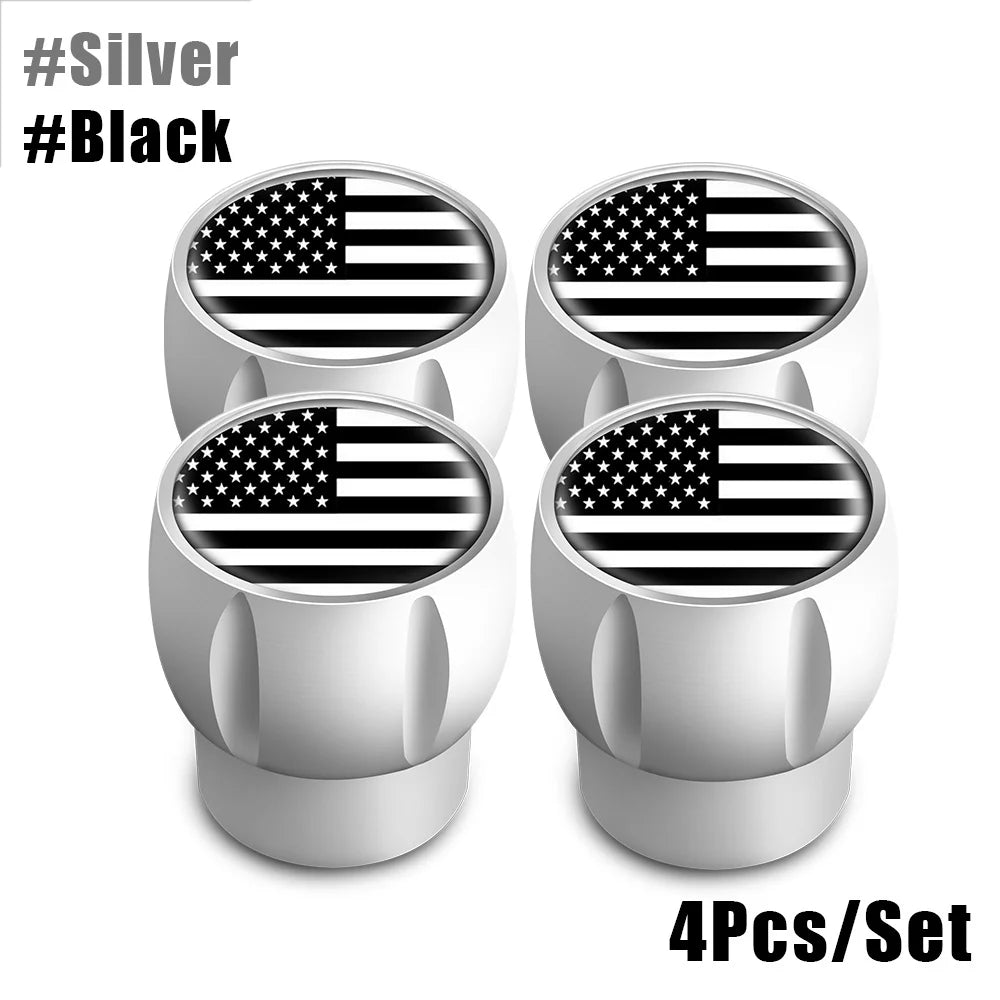 Set of four silver and black American flag tire valve caps