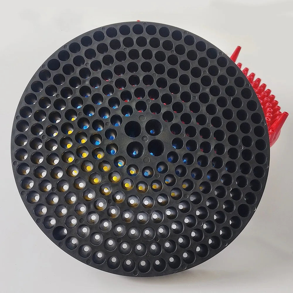 Black mesh grit guard insert for a car wash bucket with a red filter attachment.