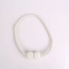A set of eight elegant pearl magnetic curtain tie-back clips forming a delicate bracelet.