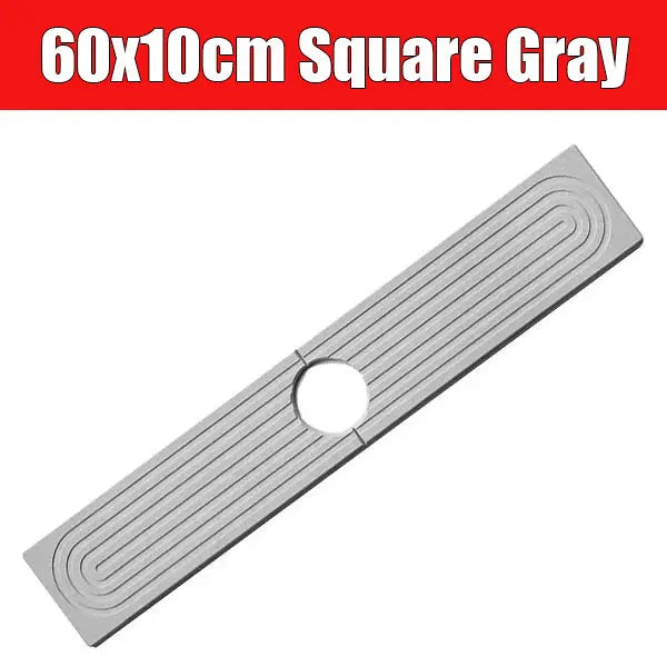 A gray square silicone mat with raised ridges and a hole, used as a quick-dry faucet mat.
