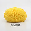 A ball of bright yellow 4-ply milk cotton yarn for knitting and crochet.