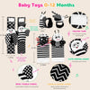 A set of baby toys including a rattle, wrist finders, and foot finders made from soft fabric.