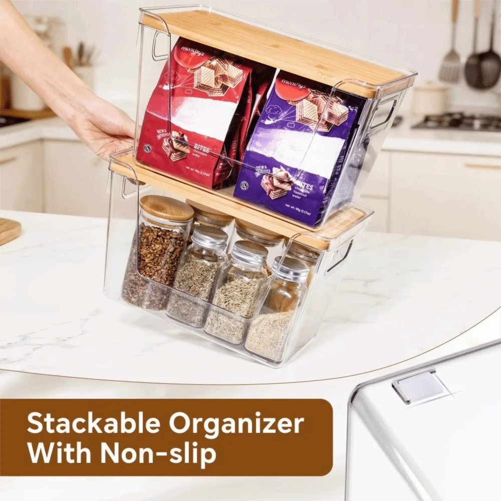 A clear stackable organizer for pantry storage featuring spice jars with bamboo lids and colorful labels.
