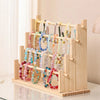 Solid wood ladder jewelry organizer with multiple storage tiers displaying various colored beaded necklaces