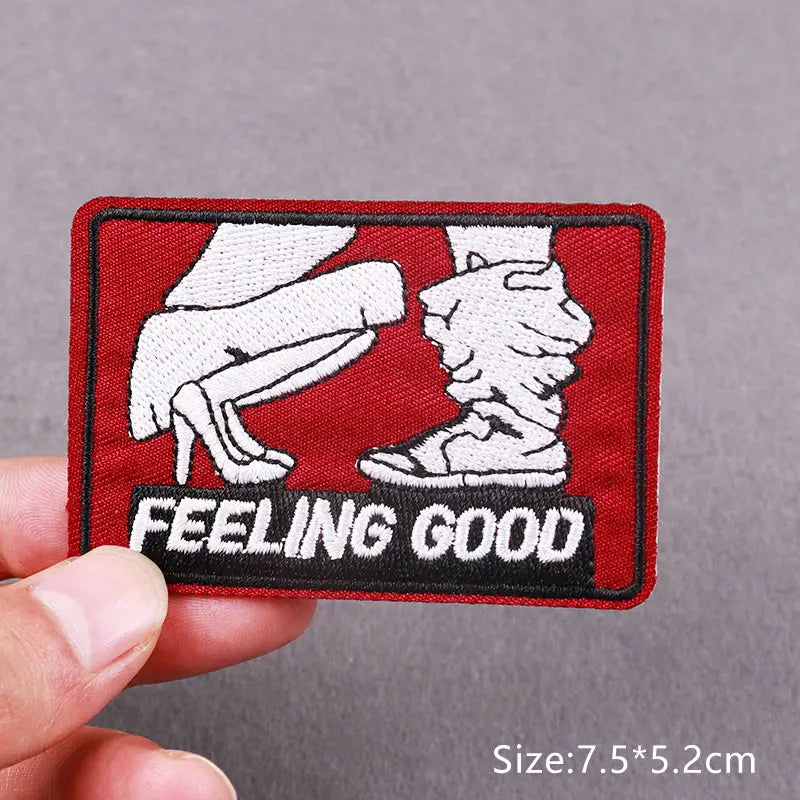 Red embroidered patch with white silhouette of a foot and text feeling good