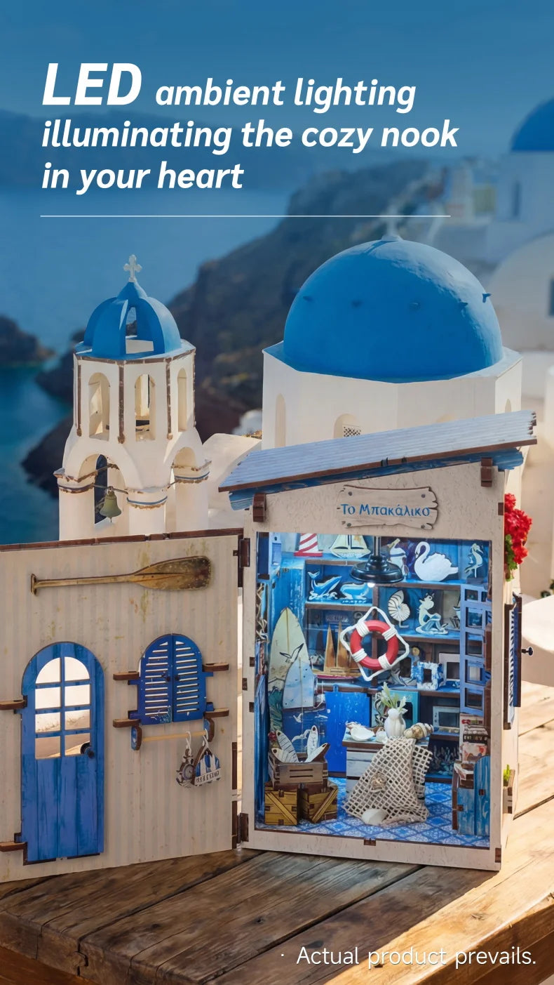 A wooden beach corner DIY book nook kit featuring a lighthouse and sea elements illuminated by LED ambient lighting.