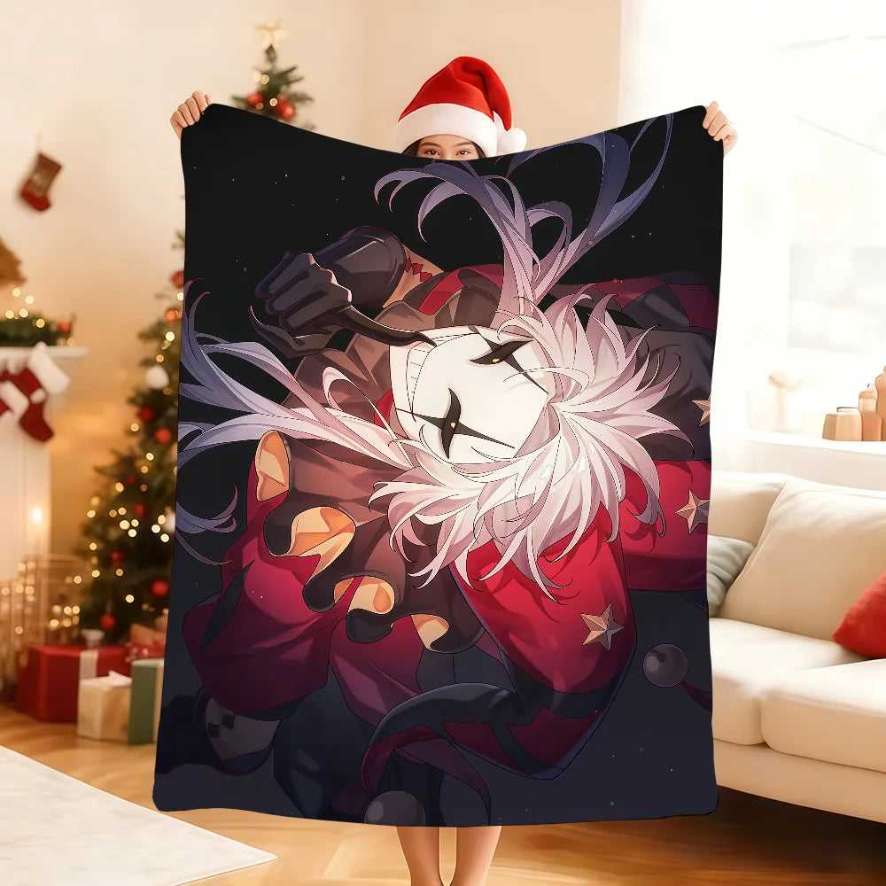 A person holds up a dark purple and red throw blanket featuring an anime-style character with pink hair and a white mask agai