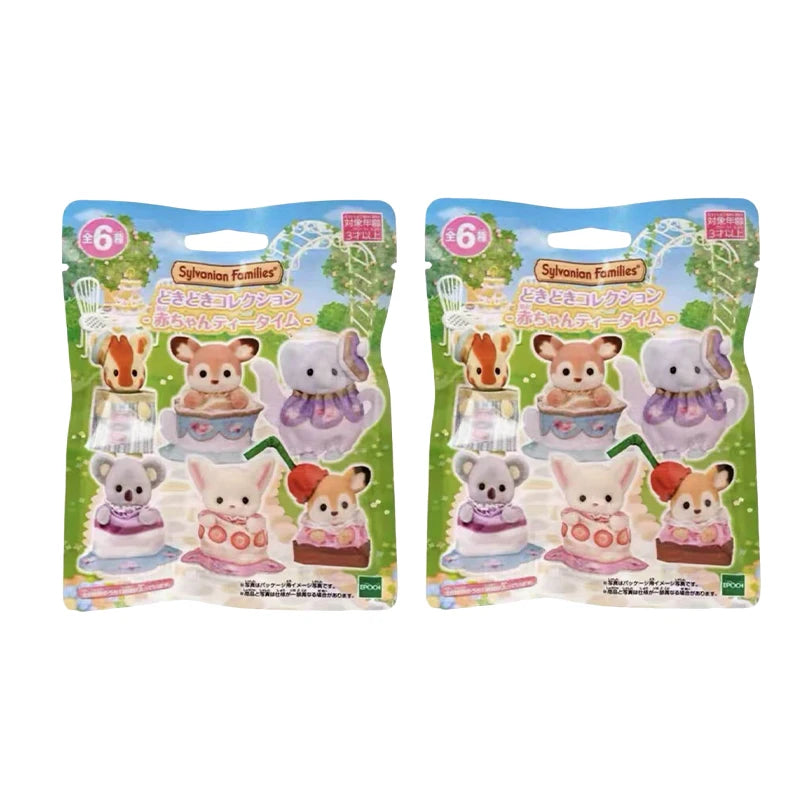 A pair of Sylvanian Families Tea Party Babies blind bag collectible figures featuring various animal characters.