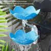 A blue lotus-shaped two-tier bathroom storage rack with drainage is shown, featuring water splashing.
