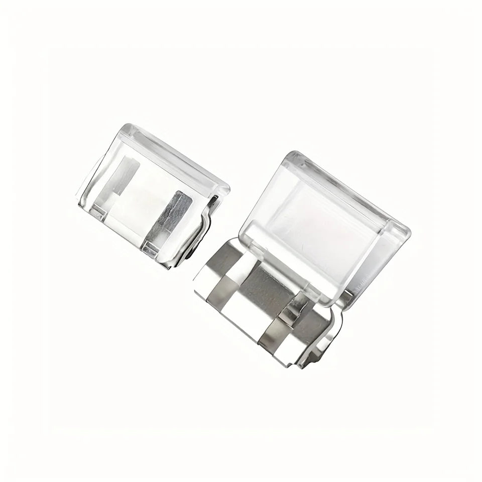 Clear plastic invisible pant hem clips with silver metal grips for keeping trousers off the floor