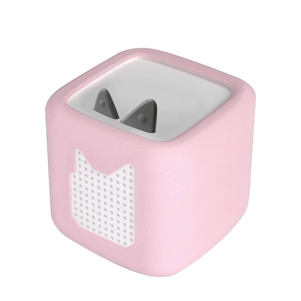 A pink silicone protective cover for a Toniebox 2 with two visible openings.