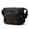 Black men's water-resistant nylon crossbody sling bag with a padded strap and zippered compartments