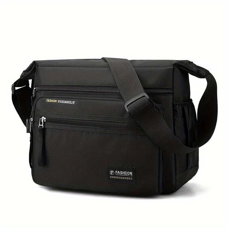 Black men's water-resistant nylon crossbody sling bag with a padded strap and zippered compartments
