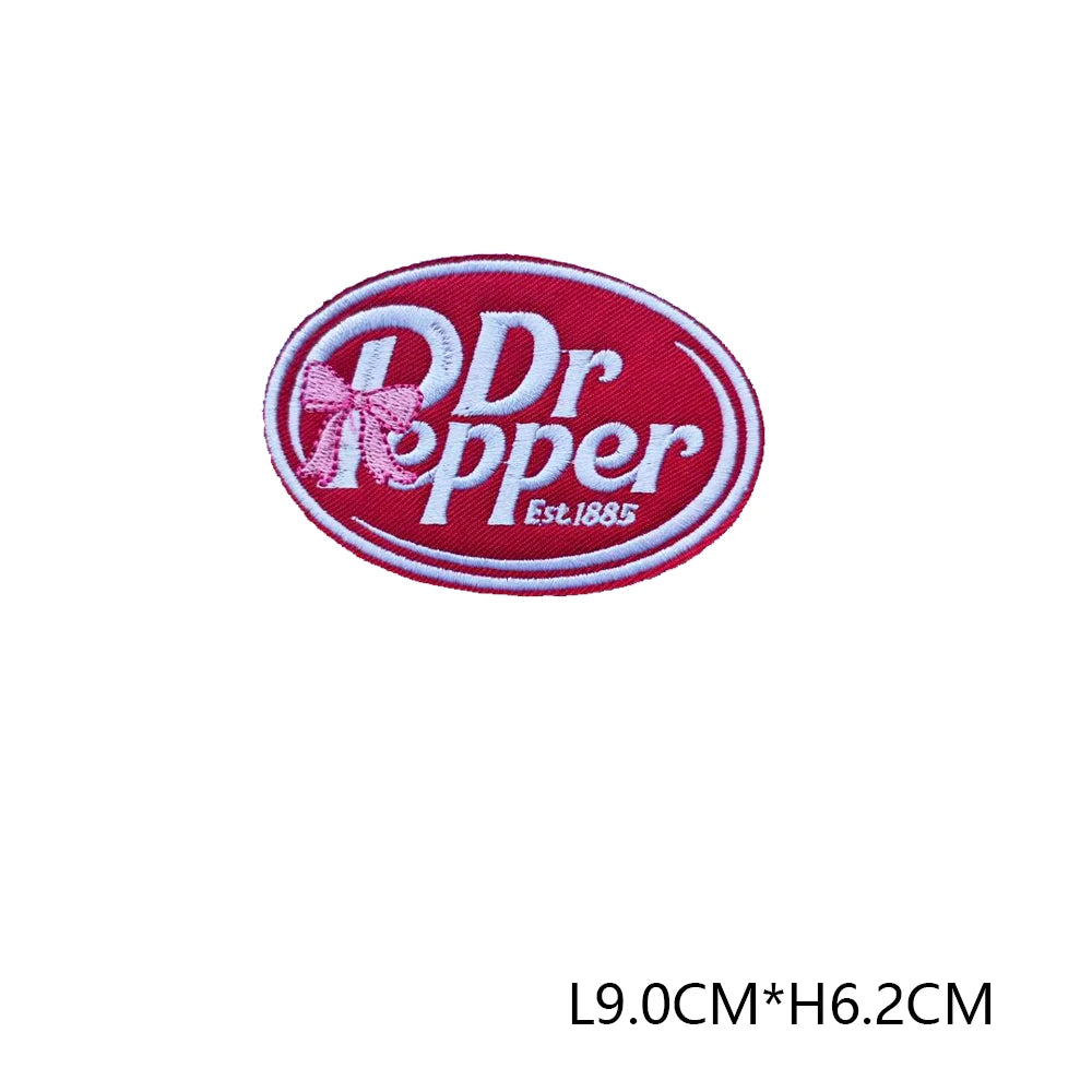 Red embroidered letter patch with the text Dr Pepper and Est 1885