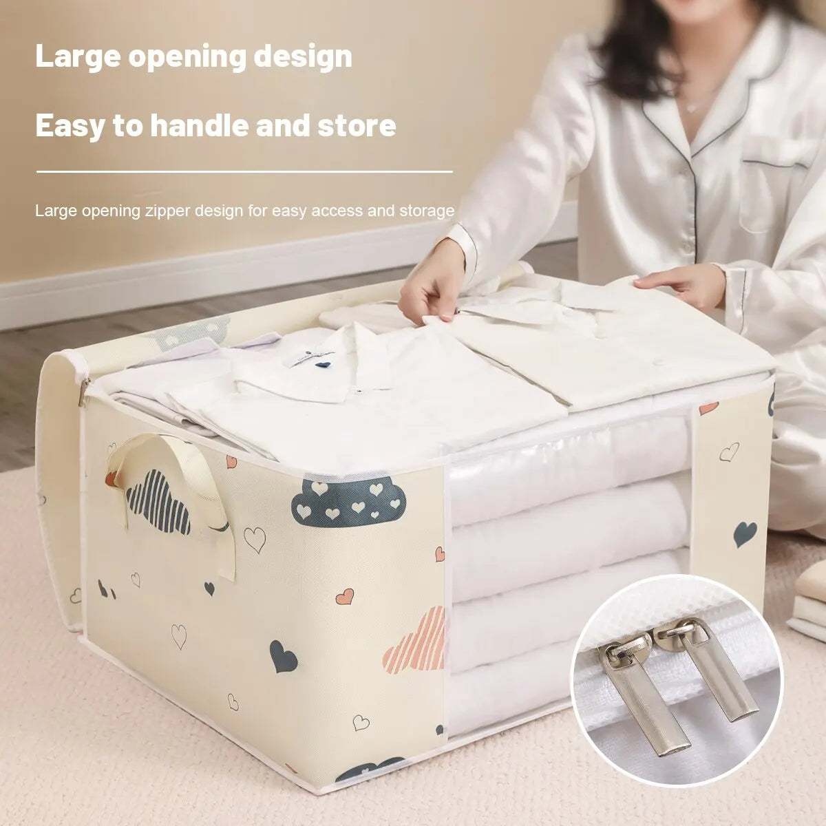 A person is handling a large opening storage bag for blankets and clothes, showing its easy access design.