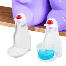 A white laundry detergent cup holder with a red drip tray is shown next to a purple detergent bottle.