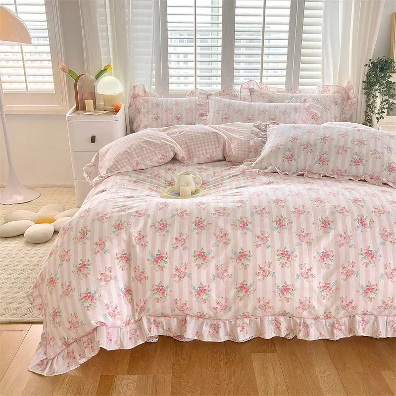 Pink floral ruffle cotton duvet cover set displayed on a bed with white window blinds.