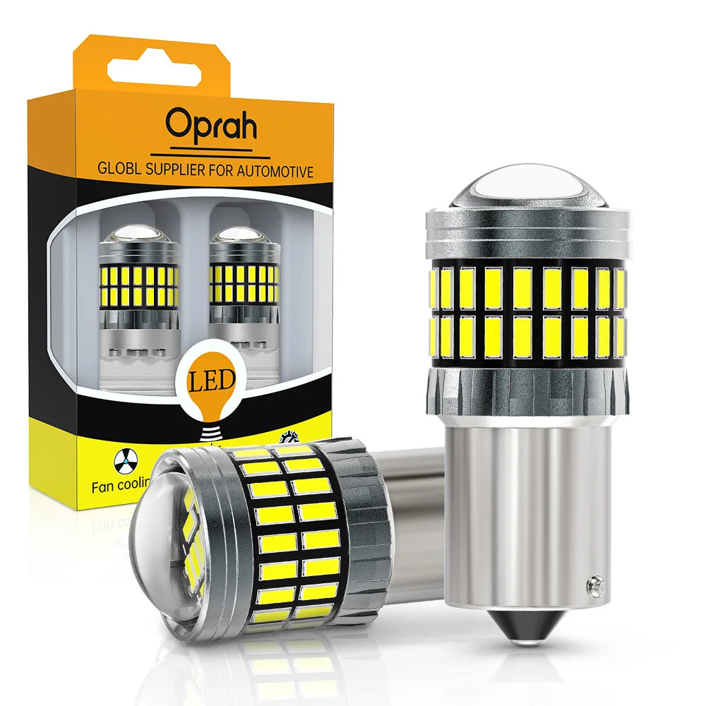 A box and a silver LED turn signal and reverse light bulb assembly for automotive use.