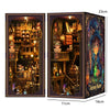 A wooden book nook kit featuring an elaborate miniature scene with LED lighting and detailed architecture.