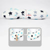 A white baby head and neck support pillow featuring black and light blue stars, shown with a measurement guide.
