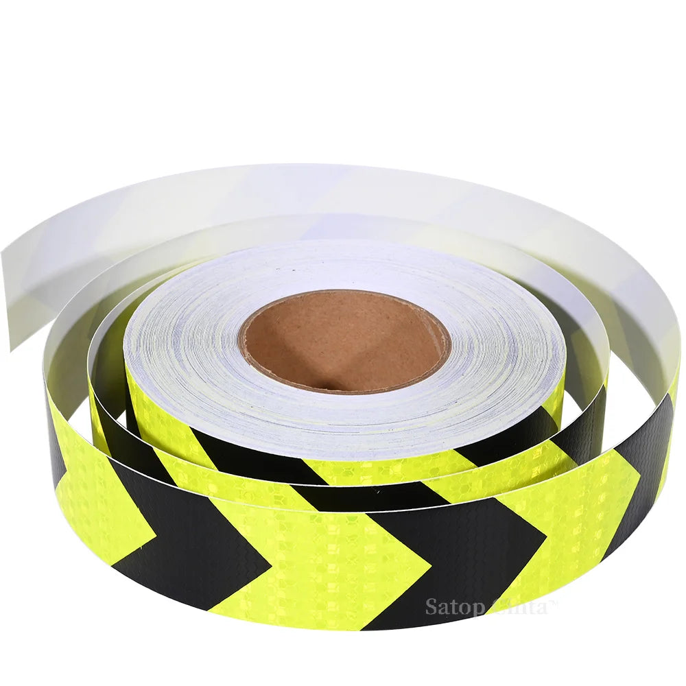 Roll of high-visibility yellow and black reflective tape with a honeycomb pattern