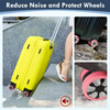 Yellow silicone suitcase wheel protectors installed on a gray surface, demonstrating noise reduction and protection for the w