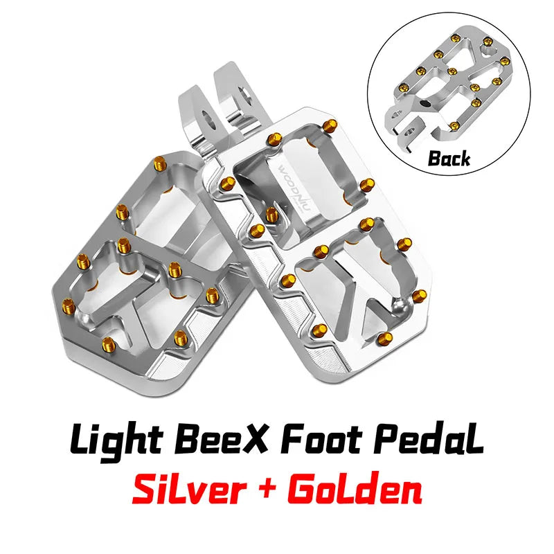 Silver and golden aluminum foot pedals for the Light Bee X/S, Talaria MX3/MX4, and Segway X160/X260.