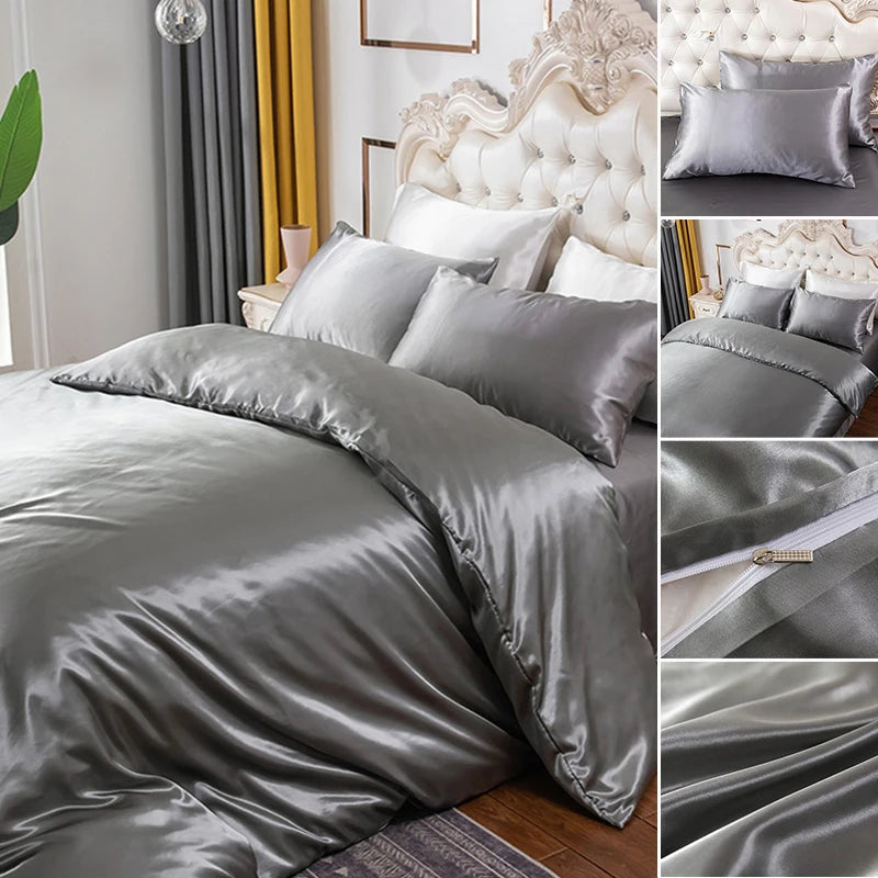 Silver silky duvet cover set featuring corner ties and a zipper on a bed with a tufted headboard