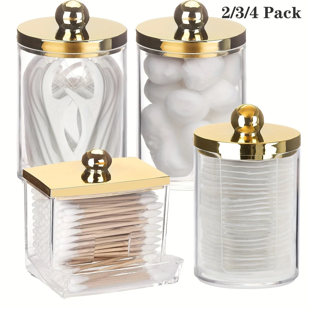 A set of three elegant apothecary jars with golden lids for storing cotton balls and swabs.