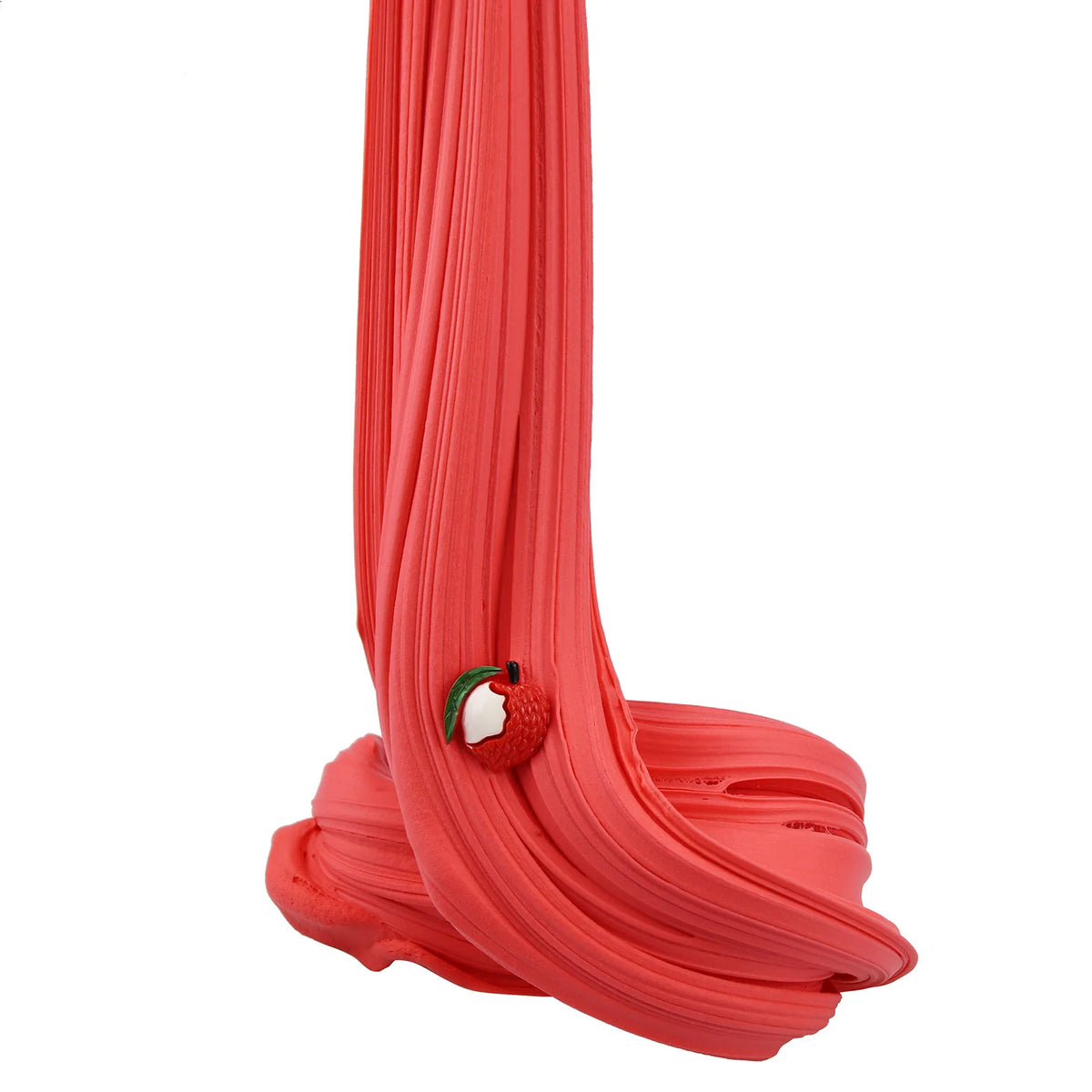 A tube of bright red slime or putty with a textured, wavy surface and a small green fruit attached.