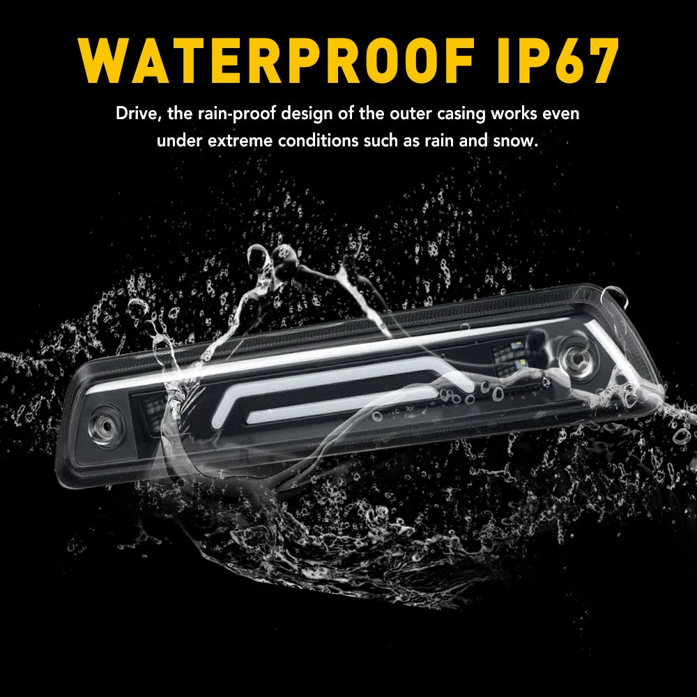 A smoked LED third brake light is shown being tested under water spray to demonstrate its waterproof IP67 rating.