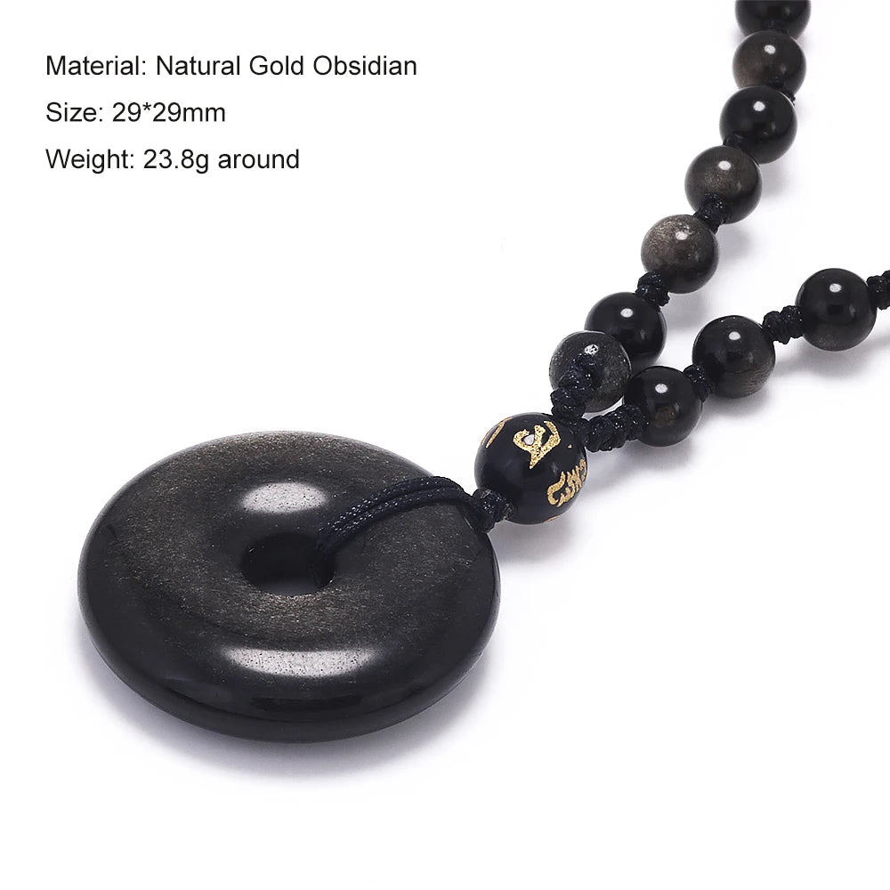 A black natural gold obsidian pendant necklace featuring smooth, dark stones on an adjustable leather cord.
