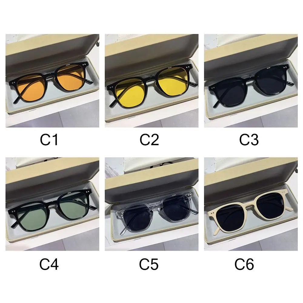 Six variations of vintage square sunglasses displayed in an open box, showing different frames and lens colors.