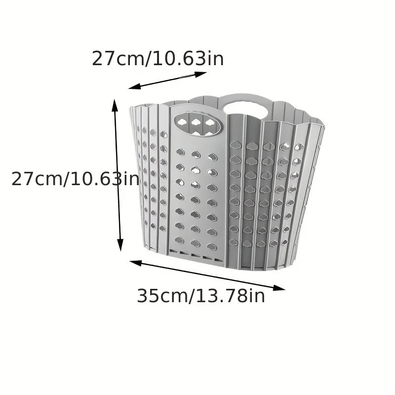 A gray folding laundry basket with handles, shown in a side view.